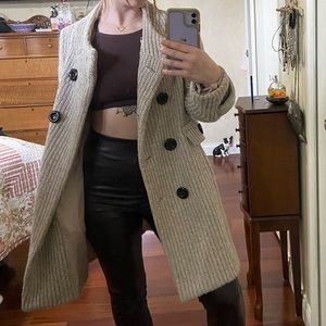 Semi long knitted over coat